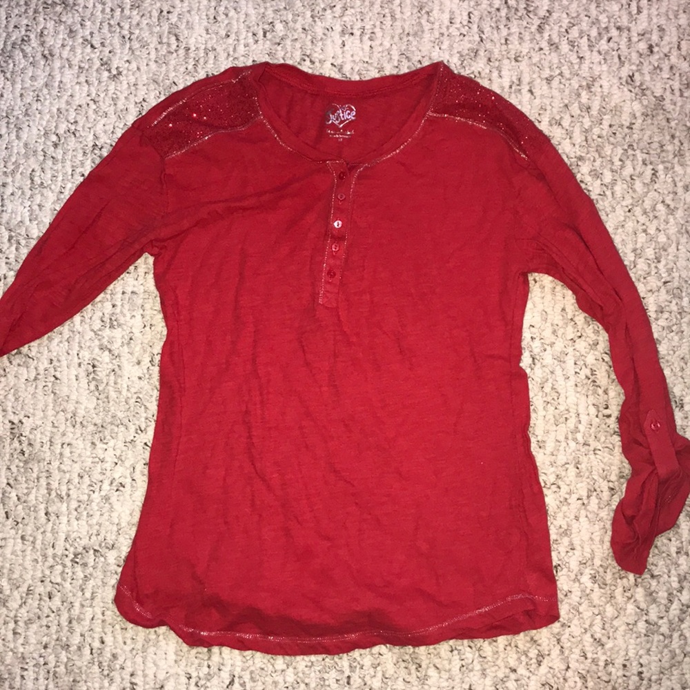 Red long sleeve shirt. With sleeve button